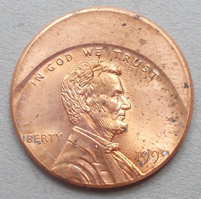 1999-Cent,-Off-Center-Strike